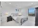 Cozy bedroom featuring a comfortable bed, bedside lamps, and a scenic window view at 8700 Lost Lake Dr, Franktown, CO 80116