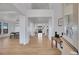 Bright, spacious foyer features hardwood flooring, large windows, and an open floor plan leading to the living spaces at 8700 Lost Lake Dr, Franktown, CO 80116