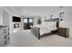 Luxurious main bedroom with a fireplace, access to a balcony, and stylish decor at 8700 Lost Lake Dr, Franktown, CO 80116