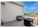 Relaxing back deck featuring a comfortable bench and modern fire pit, ideal for outdoor enjoyment at 509 High Point Dr, Longmont, CO 80504