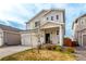 Attractive two-story home featuring a two-car garage and a well-kept lawn, situated in a friendly neighborhood at 509 High Point Dr, Longmont, CO 80504