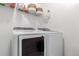 Modern laundry room featuring new washer and dryer appliances at 509 High Point Dr, Longmont, CO 80504