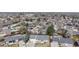 Panoramic aerial view capturing a vibrant residential neighborhood with well-manicured lawns and mature trees at 11813 Bellaire Cir, Thornton, CO 80233