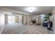 Spacious finished basement with neutral carpet and recessed lighting at 11813 Bellaire Cir, Thornton, CO 80233