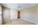 Neutral bedroom features carpet, a closet, and a light fixture at 11813 Bellaire Cir, Thornton, CO 80233