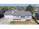 Attractive single-story home with a well-maintained lawn and landscaping at 11813 Bellaire Cir, Thornton, CO 80233