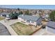 Charming single-story home with landscaped front yard and mature trees at 11813 Bellaire Cir, Thornton, CO 80233