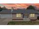 Charming single-story house with a two car garage, new landscaping, and lovely front porch at 11813 Bellaire Cir, Thornton, CO 80233
