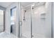 Modern bathroom featuring an all-glass shower enclosure and stylish fixtures at 14035 Touchstone St, Parker, CO 80134
