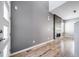 The living room features hardwood floors, a fireplace, and plenty of natural light from the front door windows at 14035 Touchstone St, Parker, CO 80134