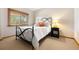 Bedroom with natural light, neutral color, and view of trees at 29962 Troutdale Ridge Rd, Evergreen, CO 80439