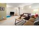 Spacious living room with sofas, TV and recessed lighting at 29962 Troutdale Ridge Rd, Evergreen, CO 80439