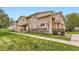 Attractive townhome featuring a well-manicured lawn and tasteful landscaping at 1601 Great Western Dr # D3, Longmont, CO 80501
