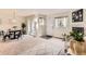 Spacious living room with dining area, fireplace, sliding doors, and plenty of natural light at 1601 Great Western Dr # D3, Longmont, CO 80501