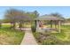 Community playground and picnic shelter on manicured lawn at 1601 Great Western Dr # D3, Longmont, CO 80501