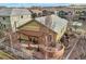 Aerial view of a well-maintained backyard with a pergola-covered patio and landscaped garden at 3325 Yale Dr, Broomfield, CO 80023