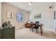 Home office with a desk, leather chair, and a large window for natural light at 3325 Yale Dr, Broomfield, CO 80023