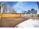 Large backyard with wooden fence and small shed at 655 S Osceola St, Denver, CO 80219