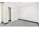 Bedroom with grey carpet and a built-in closet at 655 S Osceola St, Denver, CO 80219