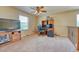A spacious bedroom features an entertainment center and a dedicated computer space at 10142 Mountain Maple Dr, Highlands Ranch, CO 80129