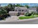 Charming two-story home boasts mature landscaping, a two-car garage, and inviting curb appeal at 10142 Mountain Maple Dr, Highlands Ranch, CO 80129