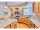 Beautiful kitchen with modern appliances, granite countertops, and plenty of storage at 10142 Mountain Maple Dr, Highlands Ranch, CO 80129
