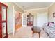 Open living room features a staircase view and french doors at 10142 Mountain Maple Dr, Highlands Ranch, CO 80129