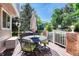 Outdoor patio featuring a dining table and umbrella, perfect for entertaining at 10142 Mountain Maple Dr, Highlands Ranch, CO 80129
