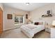 Comfortable bedroom with natural light, featuring neutral tones and closet space at 6297 E 167Th Ave, Brighton, CO 80602