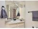 This bathroom has a vanity and shower with a floral curtain at 14129 E Dickinson Dr # D, Aurora, CO 80014