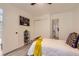 This bedroom has laminate floors, closet, and en suite bathroom at 14129 E Dickinson Dr # D, Aurora, CO 80014