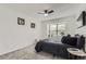 Comfortable bedroom featuring plush carpeting, and a bright window at 14129 E Dickinson Dr # D, Aurora, CO 80014