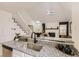 Modern kitchen features granite countertops, a stainless steel sink, and pendant lighting at 14129 E Dickinson Dr # D, Aurora, CO 80014