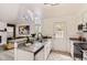 Bright kitchen features granite countertops, stainless steel appliances, and an open layout to the living space at 14129 E Dickinson Dr # D, Aurora, CO 80014