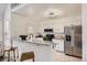 Modern kitchen with stainless steel appliances, a granite counter, and stylish fixtures at 14129 E Dickinson Dr # D, Aurora, CO 80014