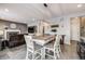 Kitchen dining area with farmhouse table and chairs at 2633 Garganey Dr, Castle Rock, CO 80104