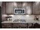 Modern kitchen with stainless steel appliances and white subway tile at 2633 Garganey Dr, Castle Rock, CO 80104