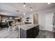 Island kitchen with granite countertops and ample cabinet space at 2633 Garganey Dr, Castle Rock, CO 80104