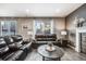 Bright living room with large window, comfortable seating, and a view at 2633 Garganey Dr, Castle Rock, CO 80104