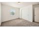 Spacious bedroom with neutral carpet and double door closet at 238 Kino Court, Brighton, CO 80601