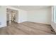 Bright living room featuring hardwood floors and an open floor plan at 238 Kino Court, Brighton, CO 80601