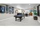 Finished basement with a pool table, bar area, and neutral carpet throughout at 5707 Cadara Way, Parker, CO 80134