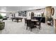 Finished basement with a pool table, poker table, bar area, and comfortable seating at 5707 Cadara Way, Parker, CO 80134