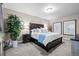 Spacious main bedroom featuring an abundance of natural light and a comfortable ambiance at 5707 Cadara Way, Parker, CO 80134