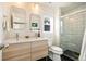 Modern bathroom with double vanity and walk-in shower at 1152 Clayton St, Denver, CO 80206