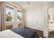 Bright bedroom with ample closet space and city views at 1152 Clayton St, Denver, CO 80206