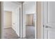 View through doorways of carpeted bedrooms, providing cozy and private spaces at 1350 Josephine St # 502, Denver, CO 80206