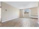 Cozy living room with a large window, neutral walls, and stylish flooring, creating a comfortable living space at 1350 Josephine St # 502, Denver, CO 80206