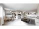 Bright, open living space featuring contemporary furnishings, hardwood floors, and lots of natural light at 1350 Josephine St # 502, Denver, CO 80206