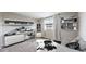 Bright home office featuring modern shelving, neutral decor, and a stylish work space for productivity at 1350 Josephine St # 502, Denver, CO 80206
